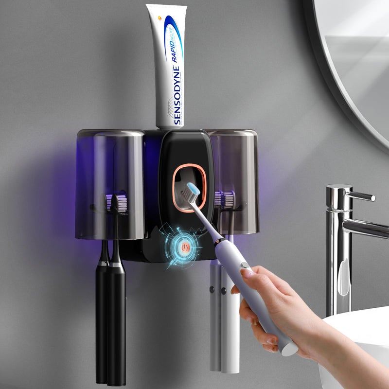 Wekity Toothbrush Holders for Bathrooms  Wekity Automatic Toothpaste Dispenser Space Saving Toothbrush and Toothpaste Holder Toothbrush Holder Wall Mounted with 2 Cups for Bathroom (Black) - Image 1